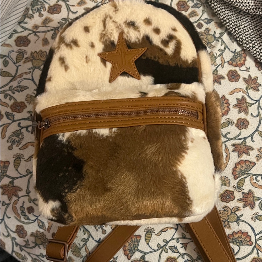 Jeffree Star Faux Fur Backpack with Brown and Black Cow Print